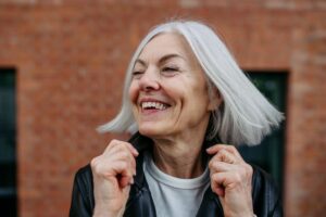 Smiling woman with healthy hair in Long Island, New York